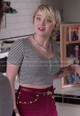 Roxie’s red studded shorts and striped crop top on Kevin from Work