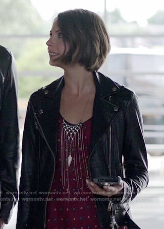 Thea’s red printed top and leather jacket on Arrow