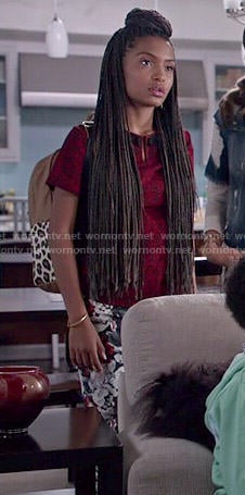 Zoey’s red top, floral jeans and leopard print backpack on Black-ish
