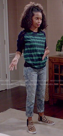 Zoey’s navy and green tie dyed sweater, checked jeans and leopard print high top sneakers on Black-ish