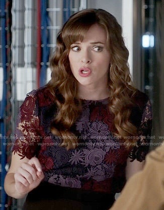 Caitlin’s navy, red and purple lace top on The Flash