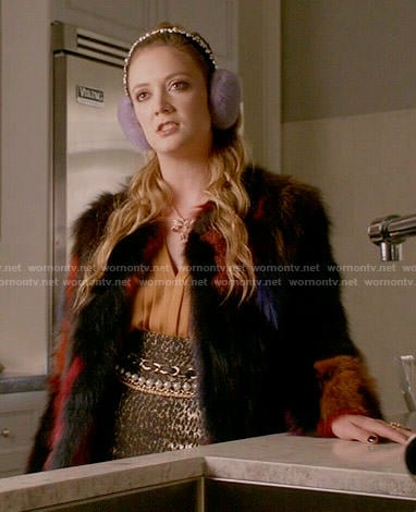 Chanel 3’s yellow pleated blouse and metallic leopard print skirt on Scream Queens