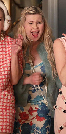 Chanel 5’s blue and red floral dress and mint fur jacket on Scream Queens