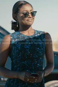 Daisy’s blue printed peplum top and sunglasses on Madam Secretary