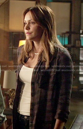 Paige’s dark plaid shirt on Scorpion