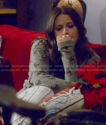 Quinn’s skull print cardigan on Scandal