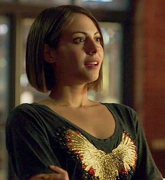 Thea’s gold embroidered eagle tee on Arrow