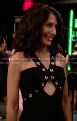 Abby’s black cutout dress with grommet trim on Girlfriends Guide to Divorce