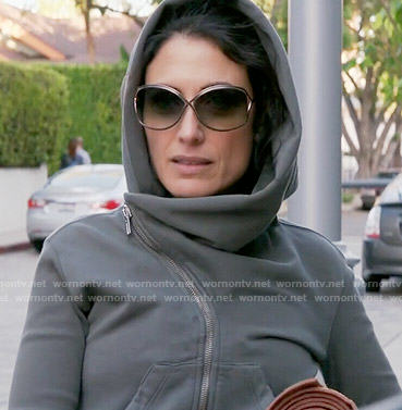 Abby’s grey asymmetric hoodie and cross back top on Girlfriends Guide to Divorce
