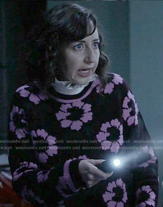 Carol’s black and pink floral sweater on Last Man on Earth