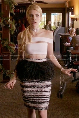 Chanel’s black tweed and feather skirt and white off-shoulder crop top on Scream Queens
