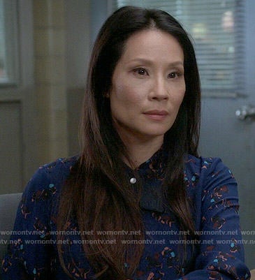 Joan’s blue printed shirt on Elementary