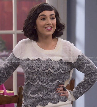 Mandy’s white sweater with black lace on Last Man Standing