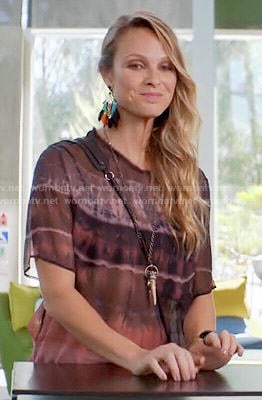 Phoebe’s tie dye print top and feather earrings on Girlfriends Guide to Divorce