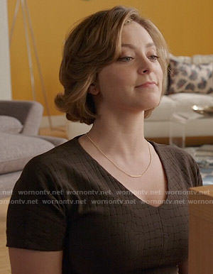 Rebecca’s black crocodile textured dress on Crazy Ex-Girlfriend