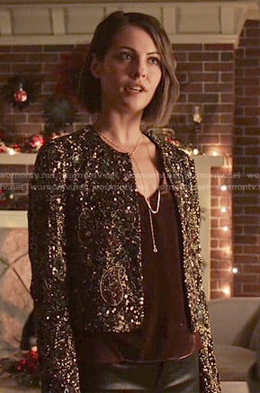 Thea’s burgundy velvet top and embellished jacket on Arrow
