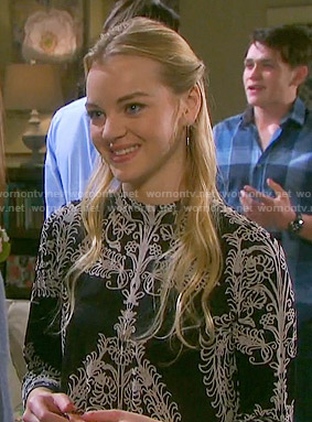 Claire’s black and white floral mock-neck dress on Days of our Lives