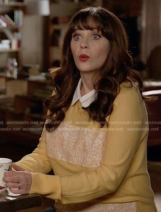 Jess’s yellow embroidered panel sweater on New Girl