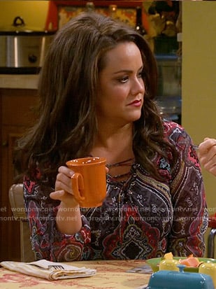 Victoria’s printed lace-up top on Mike and Molly