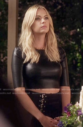 Hanna’s leather crop top and buckled skirt on Pretty Little Liars