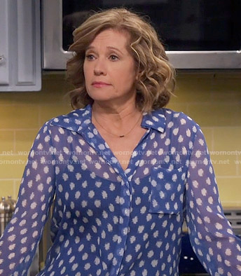 Vanessa’s blue dotted print blouse on Last Man Standing