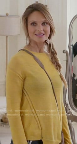 Phoebe’s yellow sweater and white spike earrings on Girlfriends Guide to Divorce
