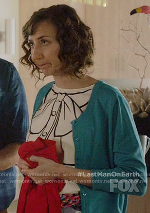 Carol’s bow graphic top on Last Man on Earth