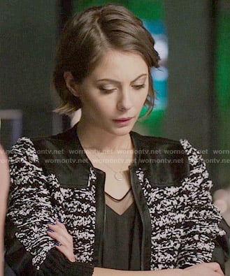Thea’s black and white knit jacket on Arrow