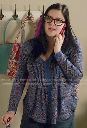 Alex’s blue printed v-neck top on Modern Family