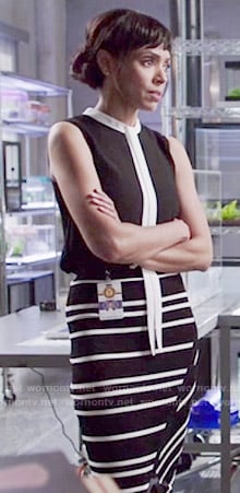 Camille’s black top with white tie and striped skirt on Bones