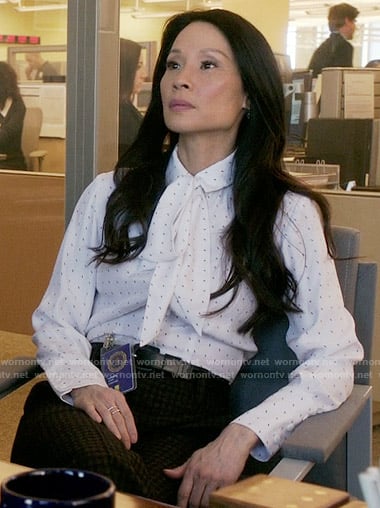 Joan’s white neck bow blouse on Elementary