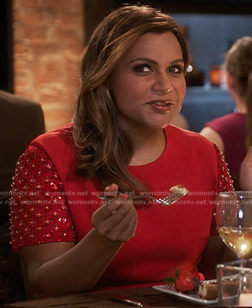 Mindy’s red dress with embellished sleeves on The Mindy Project