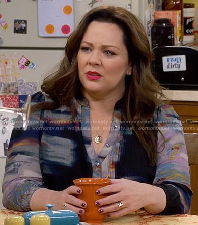 Molly’s black abstract print blouse on Mike and Molly