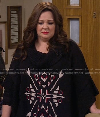 Molly’s black printed poncho on Mike and Molly
