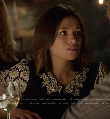 Heather’s daisy print top on Beauty and the Beast