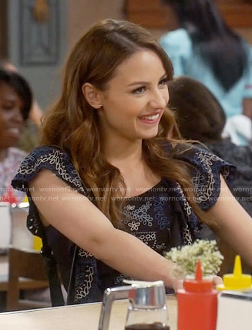 Sofia’s black embroidered top on Young and Hungry