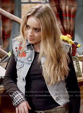 Maya’s black top with plaid cuffs and embroidered denim vest on Girl Meets World