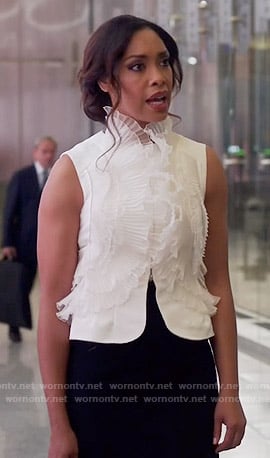 Jessica’s white ruffled front vest on Suits
