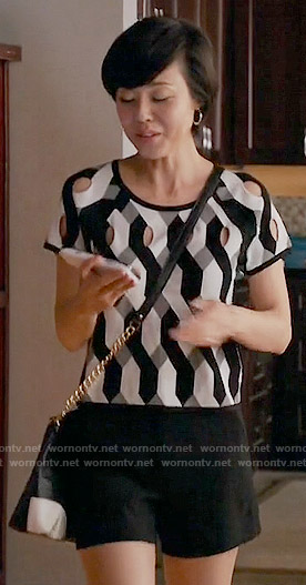Karen’s black and white geometric patterned top on Mistresses