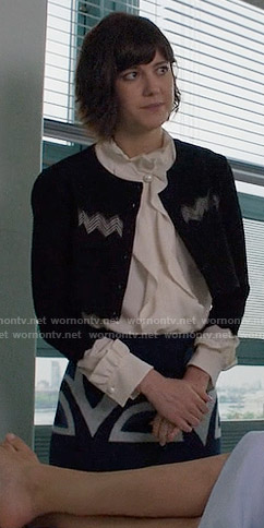 Laurel’s ruffled pearl button blouse and patterned skirt on BrainDead