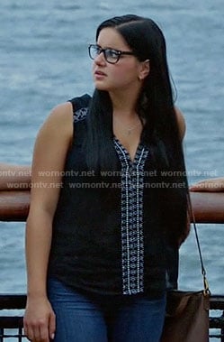 Alex’s black sleeveless top with embroidered trim on Modern Family