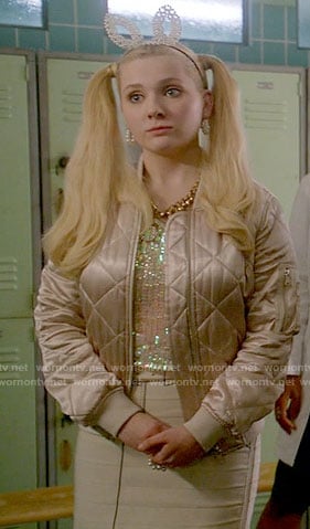 Chanel 5’s pink quilted jacket and white tromp l’oeil skirt on Scream Queens