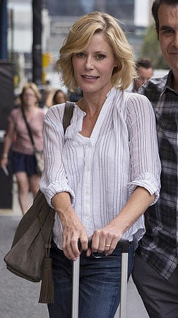 Claire’s white striped button down top on Modern Family