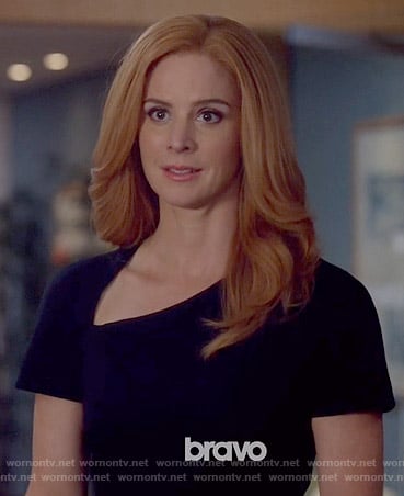 Donna’s black dress with asymmetric neckline on Suits