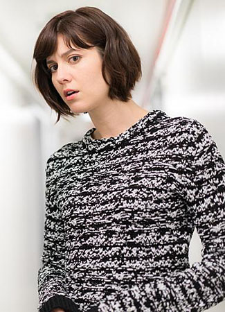 Laurel’s black and white knit sweater on BrainDead