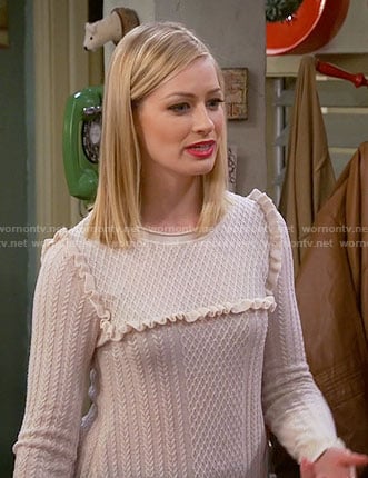Caroline’s ruffled trim sweater on 2 Broke Girls