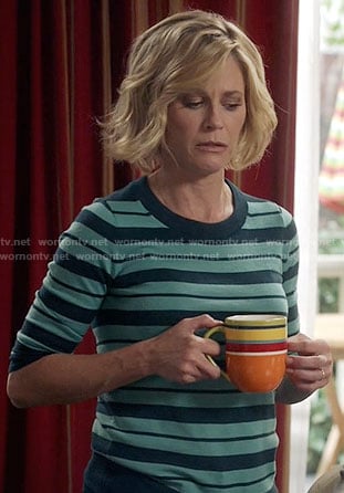 Claire’s turquoise striped sweater on Modern Family