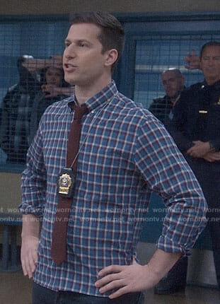 Jake’s blue, red, and white checked shirt on Brooklyn Nine-Nine