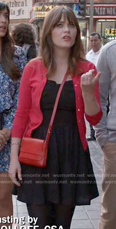 Jess’s black romper and red cardigan on New Girl