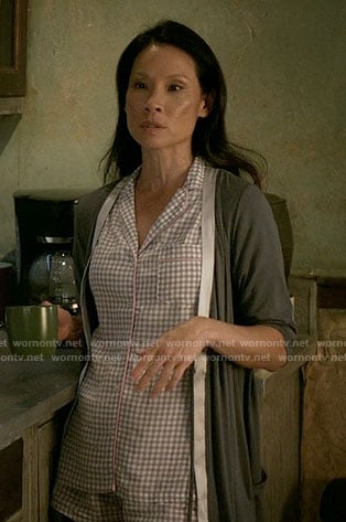 Joan’s gingham checked pajamas and satin trim robe on Elementary